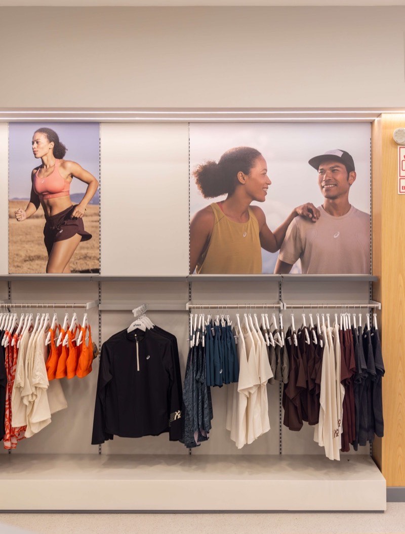 The Asics store in Uruguay, running apparel along the wall rails.