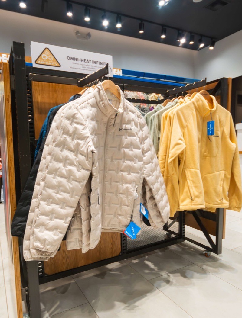 Insulated jackets on a rail inside the Columbia store in Ecuador.